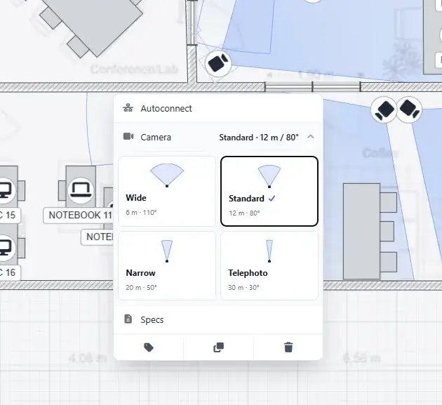 Uma câmera selecionada com o menu aberto, mostrando os presets de cobertura Grande Angular, Padrão, Estreito e Teleobjetiva, com alcance e campo de visão de cada um.